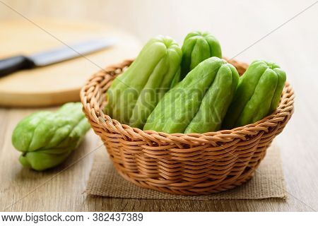 Chayote Squash Or Mirlition Squash In A Basket, Organic Vegetables