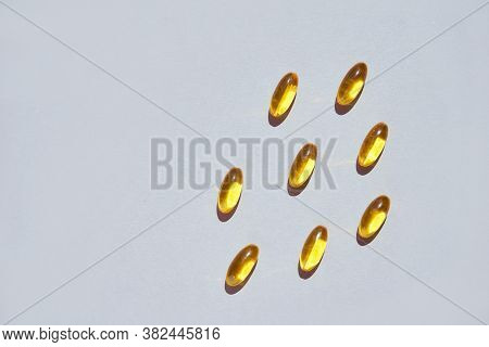 Omega3 Gel Capsule. Yellow Vitamin. Health Eating. Dietology Drug. Fish Oil Supplement. Microdosing 