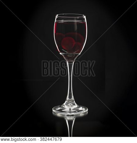 Homemade Tincture Of Red Cherry. Berry Alcoholic Drinks Concept. Homemade Red Wine Made From Ripe Ch