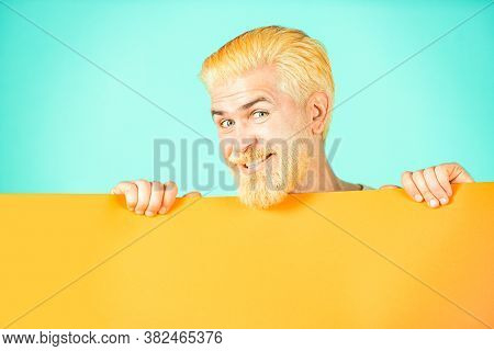 Close Up Portrait Of Man Showing Blank Signboard With Copyspace Area For Slogan Or Text. Blank, Empt