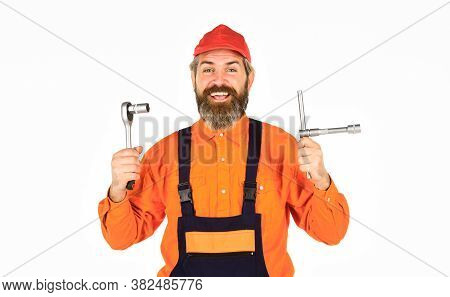 Used To Unwind Or Tighten Nuts And Bolts. Happy Man Worker. Knowing How To Change Tire Is Necessary 
