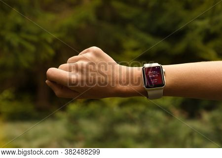 Woman With Smart Watch Checking Time Interval, Distance, Heart Rate And Burnt Calories Amount In Fit