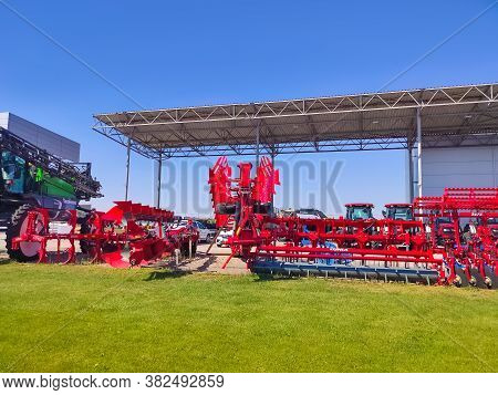 Kyiv, Ukraine - June 16, 2020: Large Disc Plough Unlu, Towing For Tractors To Plow Fields, Against T