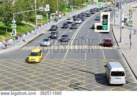 Traffic Organization. Nno Parking Yellow Cross Zone Sign On The Road, Asphalt Surface. Junction Box.