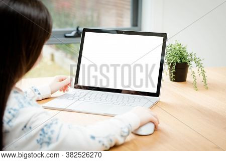 Placeit - Child Uses A Computer For School Work