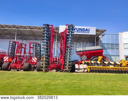 Kyiv, Ukraine - June 16, 2020: Tractor And Unia Cultivator On The Land For Minimum-tillage Technolog