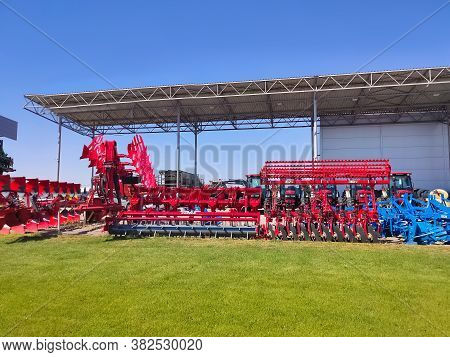 Kyiv, Ukraine - June 16, 2020: Large Disc Plough Unlu, Towing For Tractors To Plow Fields, Against T