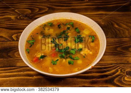 Georgian Traditional Food Soup Kharcho On Rustic Wooden Table