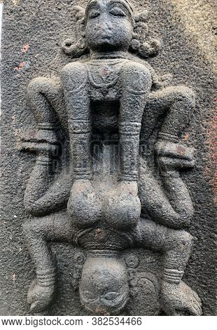 Man And Woman Performing Sex Position Act Sculpture. Bas Relief Sculpture Carved In The Walls Of Shi