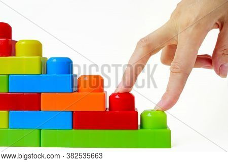 Step By Step To The Top. Business Concept Of Successful Financial Growth. The Womans Hand Steps On T