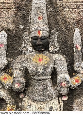 Decoration Of The Hindu Goddess Sculpture. Bas Relief Sculpture Carved In The Stone Walls At Shiva T