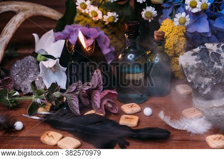Witchcraft Concept With Potions, Herbs And Occult Equipment
