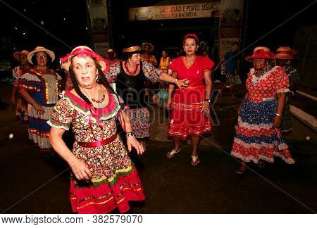 Porto Seguro, Bahia / Brazil - June 23, 2010: People Are Seen Dancing Forro And Hillbilly Dresses Du