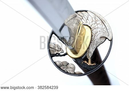 Tsuba : Hand Guard Of Japanese Sword Made Of Steel​  Isolated In White Background.  Selective Focus.