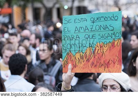 Caba, Buenos Aires / Argentina; Aug 23, 2019: Sign Text: The Amazon Is Burning To Keep Us Buying. Br