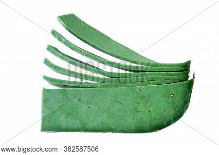 Gouda Cheese With Green Pesto On White Background
