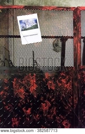 Caba, Buenos Aires / Argentina; Aug 23, 2019: Street Fence With Red Handprints And A Poster With A P