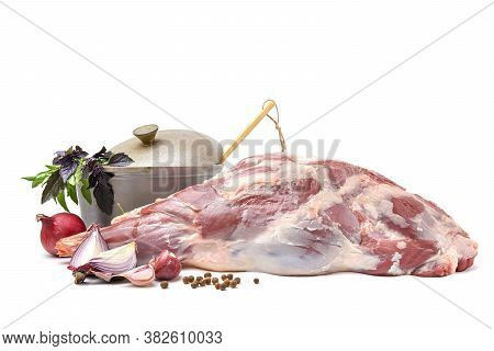 Raw Leg Of Mutton On A Bone On A White Isolated Background. Sheep Meat Close-up.a Fresh Piece Of Mut
