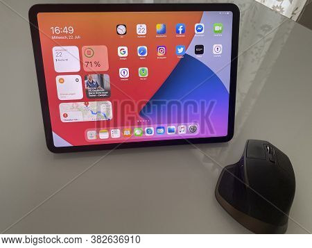 Frankfurt, Germany - July 22nd 2020: A German Photographer Installing And Testing The New Ipados 14 