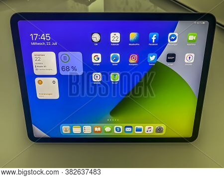 Frankfurt, Germany - July 22nd 2020: A German Photographer Installing And Testing The New Ipados 14 