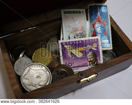 Prayagraj, Uttar Pradesh/india- May 12 2020: A Vintage Box Of Old Coins And Rare Stamps Collected By