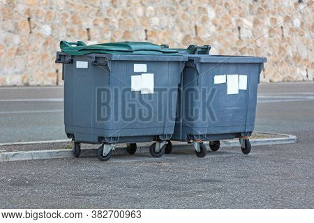 Two Dumpster Bins Containers At Street In France