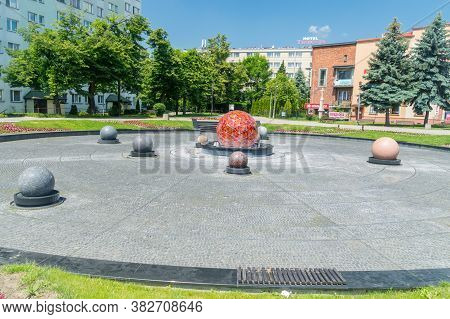 Tarnow, Poland - June 13, 2020: Square With Water Fountain With The Solar System.