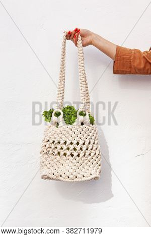Girl Is Holding Mesh Shopping Bag With Vegetables, Greens Without Plastic Bags. Zero Waste, Plastic 