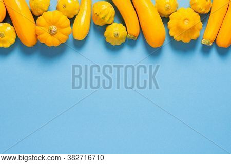 Fresh Harvest Of Zucchini And Pattison, Yellow Squash And Pattison On Blue Background