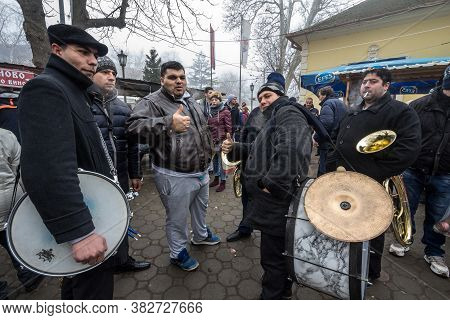 Kacarevo, February 18, 2017: Roma Music Band Waiting Before A Music Performance In The Market Of Kac