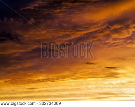 Beautiful Cloudy Sky During Sunset Or Dawn With Warm Colors And Shades, Natural Phenomena, The Sun A