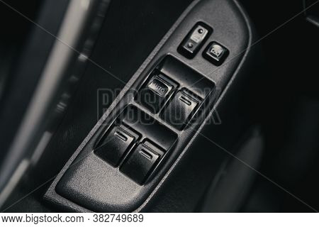 Novosibirsk/ Russia - August 25  2020: Toyota Rav-4 , Interior Of Modern Car. Side Door Buttons: Win