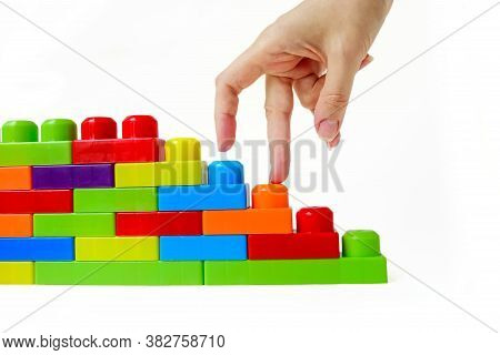 Step By Step To The Top. Business Concept Of Successful Financial Growth. The Womans Hand Steps On T