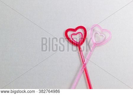 The Plastic Heart Pairs On Brown Background,valentine's Day Love Concept.top View,flat Lay.