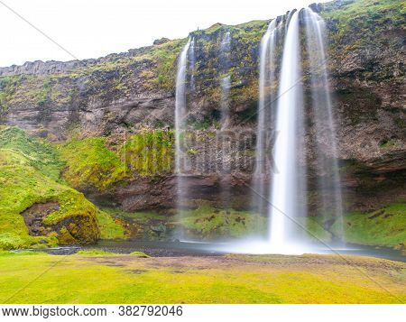 Seljaland Waterfall, Aka Seljalandsfoss, Front View On Sunny Day In Iceland