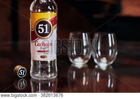 Moscow - 23.11.2019 - Cachaca 51 Bottle With Two Glasses. Brazilian Rum. Exotic Brazil Strong Alcoho