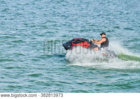 Voronezh, Russia - 23.08.2019 - Man On Water Scooter. Summer Vacation On Personal Watercraft In Trop