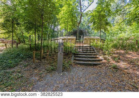 Sittard, South Limburg / Netherlands. August 4, 2020. Dirt Road With A Signpost And A Staircase Lead