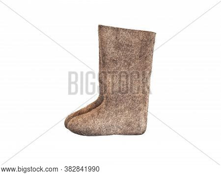 Old National Traditional Russian Winter Footwear - Felt Boot Isolated On White Background. Name Vale