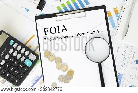 Paper With The Freedom Of Information Act Foia On A Table