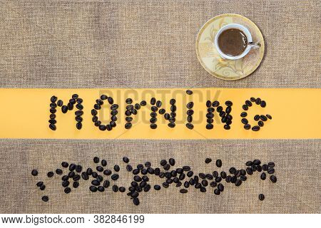 A Cup Of Coffee On A Natural Napkin And The Inscription 