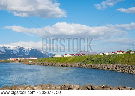 Village Of Arskogssandur In North Iceland On A Sunny Summer Day
