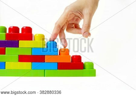 Step By Step To The Top. Business Concept Of Successful Financial Growth. The Womans Hand Steps On T