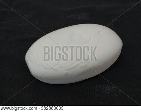 Closeup Of Pack Opened And Closed White Color Santoor Sandal And Almond Milk Soap Bar Isolated On Bl