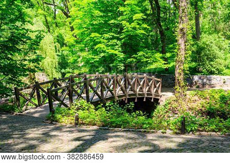Arched Wooden Bridge In Sofiyivka Park In Uman, Ukraine