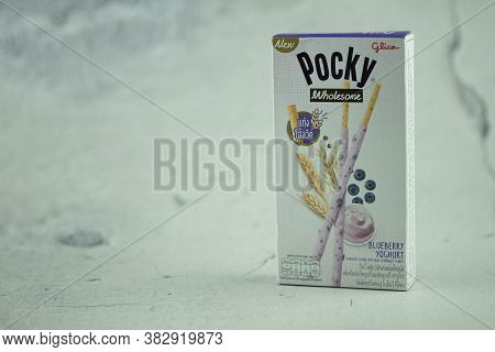 Samut Prakan, Thailand - August 29, 2020 : Glico Pocky Wholesome Blueberry Yogurt An Upgraded Pocky 