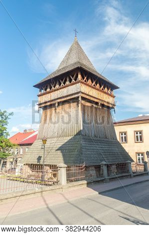 Wooden Belfry Of Roman Catholic Parish Of St. Nicholas In Bochnia, Poland.