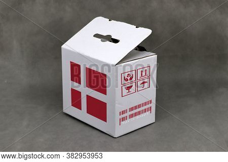 Denmark Flag On White Box And Nation Flag Barcode With Fragile Symbol. The Concept Of Export Trading