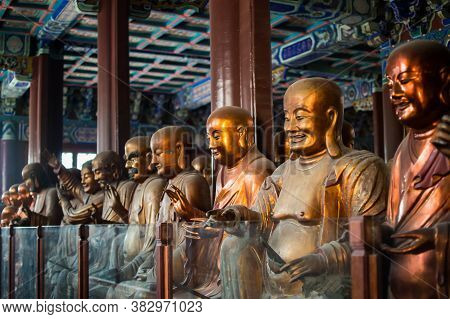 Beijing / China - March 7, 2015: Life-size Statues Of Arhats (buddhist Saints) In The Temple Of Azur