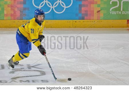 INNSBRUCK, Østrig - 20 januar Emmy Alasalmi (Sverige) og hendes team slog Kazachstan 11:0 i Lundsgaard